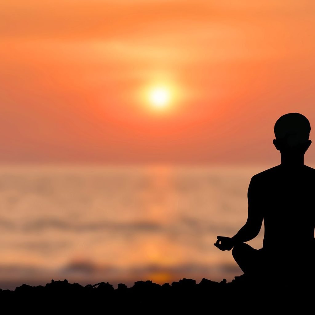 An image of a man immersed in Mindfulness Meditation.