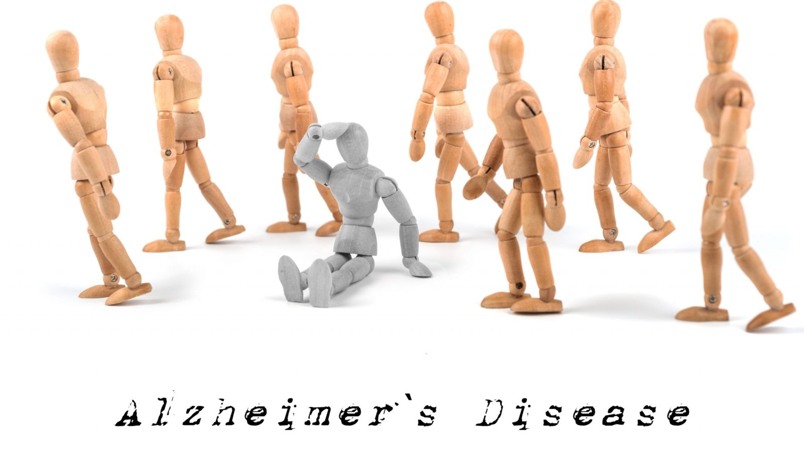 Alzheimer's disease concept - wooden mannequin sitting confused in waking group.