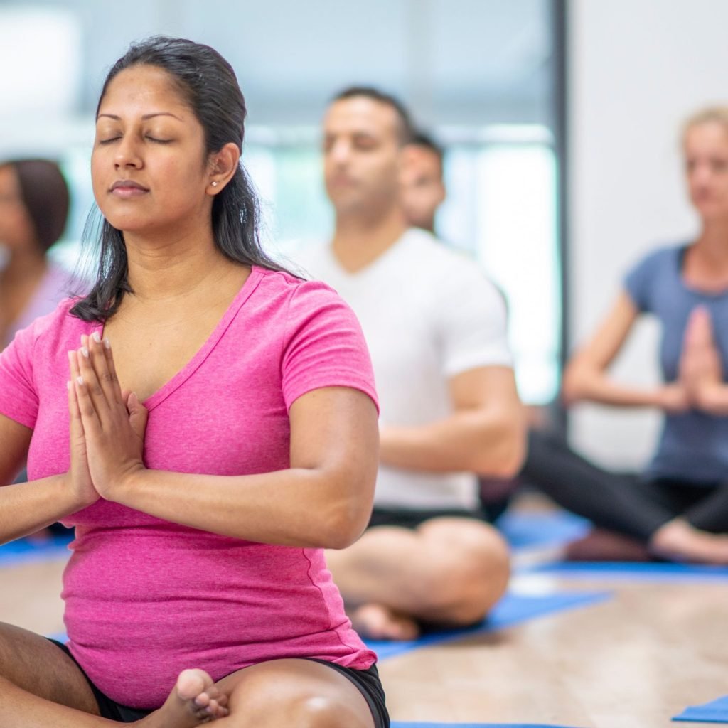 Yoga for women: A woman seen practising one of the yogic asanas.
